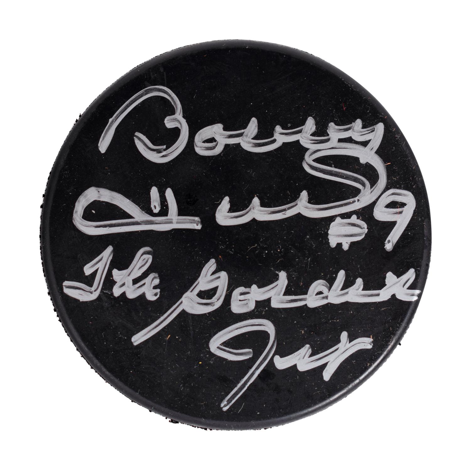 (Sports) A group of hockey memorabilia, comprising: