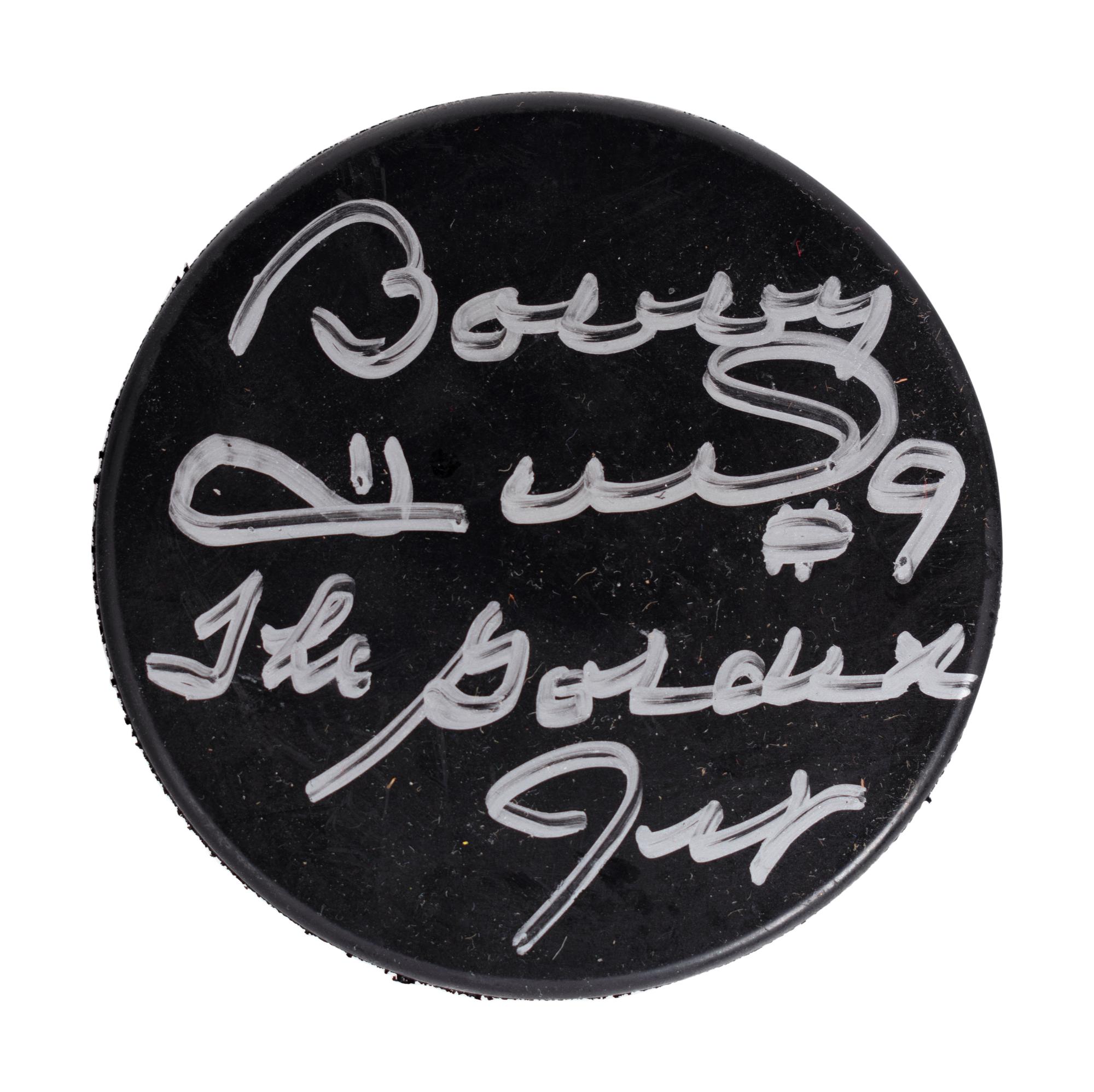 (Sports) A group of hockey memorabilia, comprising: