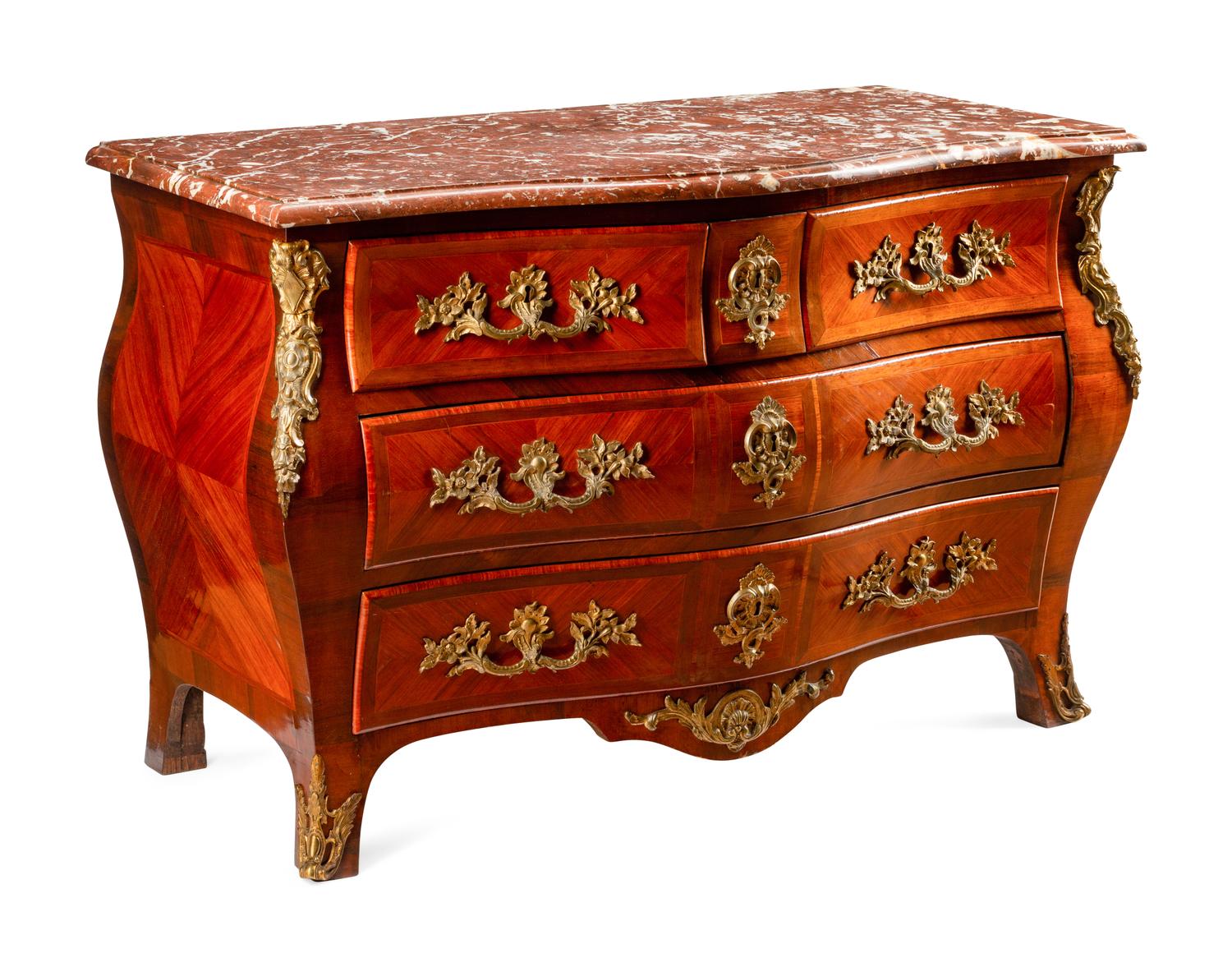 A Régence Style Gilt Bronze Mounted Kingwood Marble-Top Commode