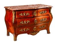 A Régence Style Gilt Bronze Mounted Kingwood Marble-Top Commode