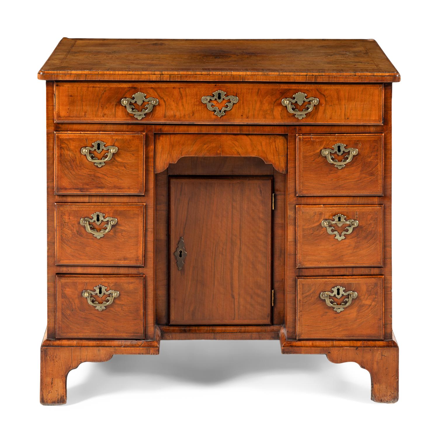 A George II Walnut Kneehole Desk