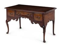 A Queen Anne Style Mahogany Desk