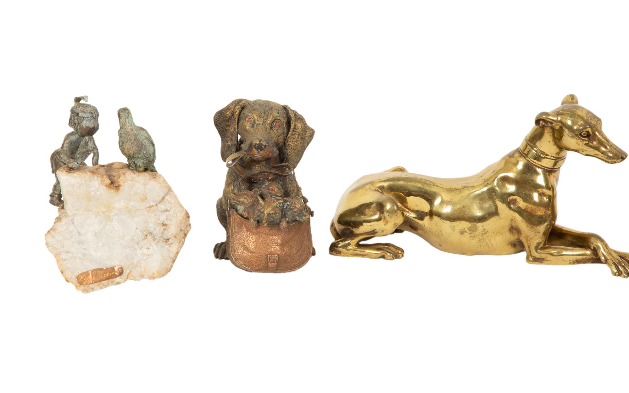 A Group of Brass and Patinated Metal Desk Accessories