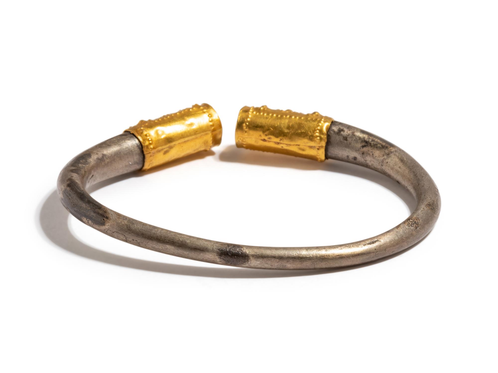 A Celtic Silver and Gold Bracelet
