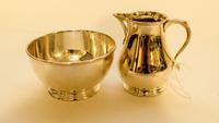 An English Silver Creamer and Sugar Set Diameter 31 3/4 inches. — WALTER H. WILSON, 20TH CENTURY