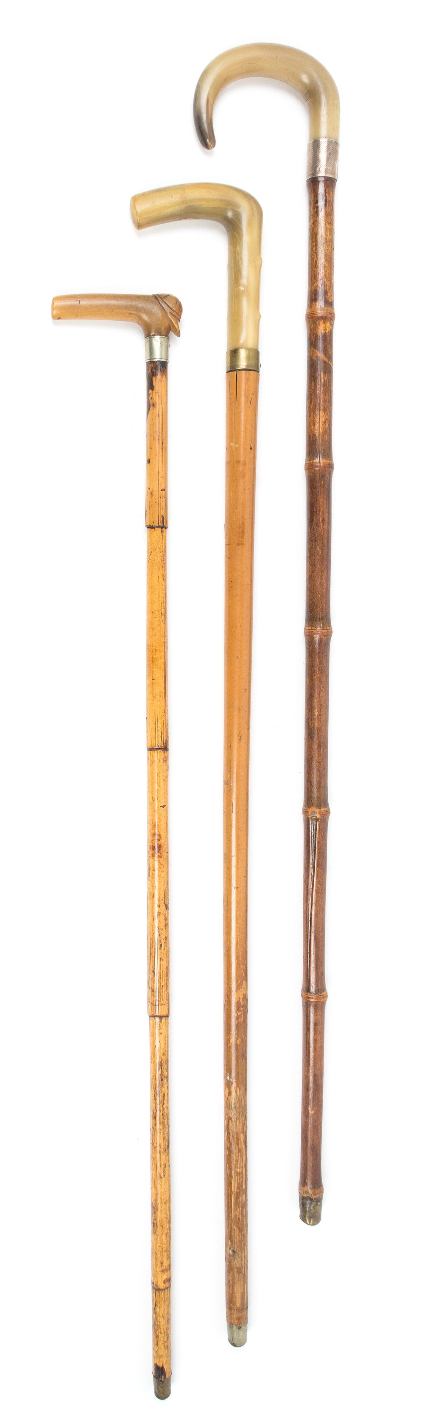 Three Sword Canes Length of longest 35 1/4 inches.