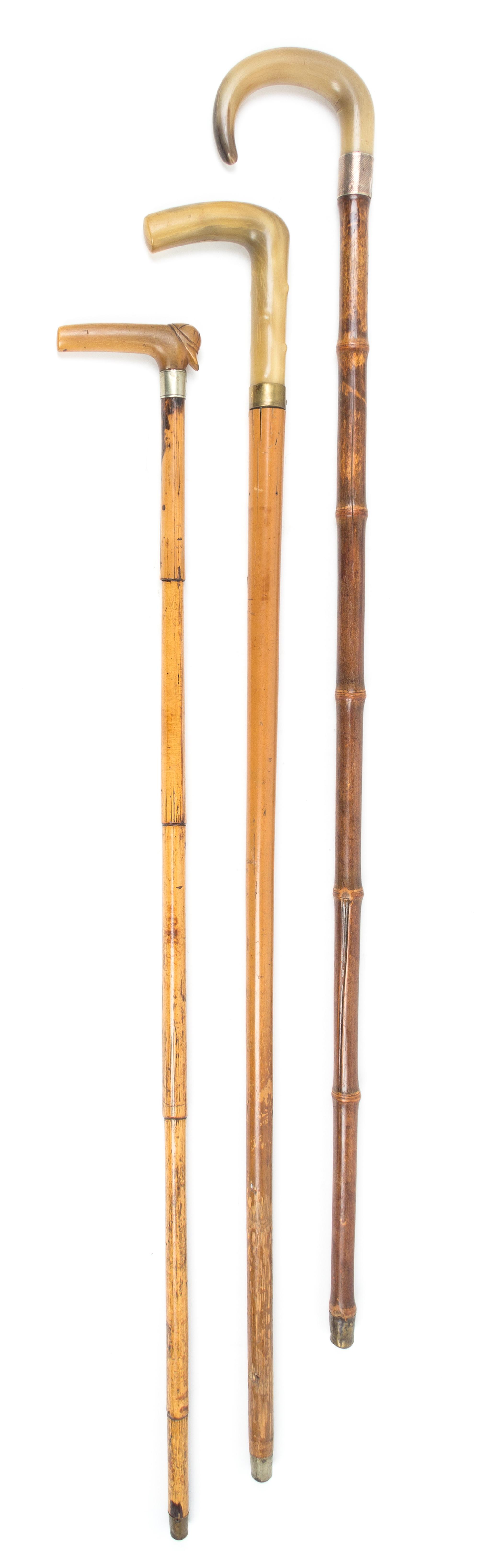 Three Sword Canes Length of longest 35 1/4 inches.