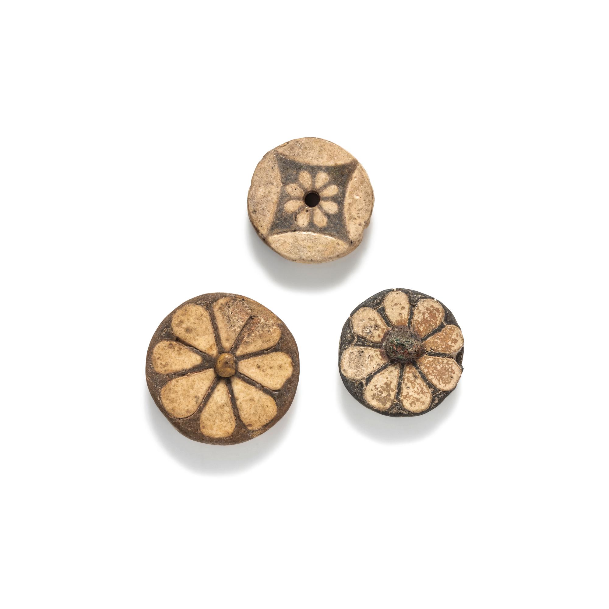 Three Egyptian Faience Floral Inlays