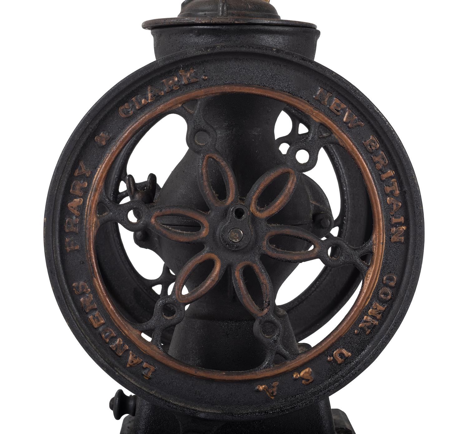 A Landers, Frary & Clark Cast Iron Coffee Mill with an Eagle Finial