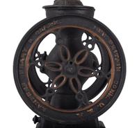 A Landers, Frary & Clark Cast Iron Coffee Mill with an Eagle Finial