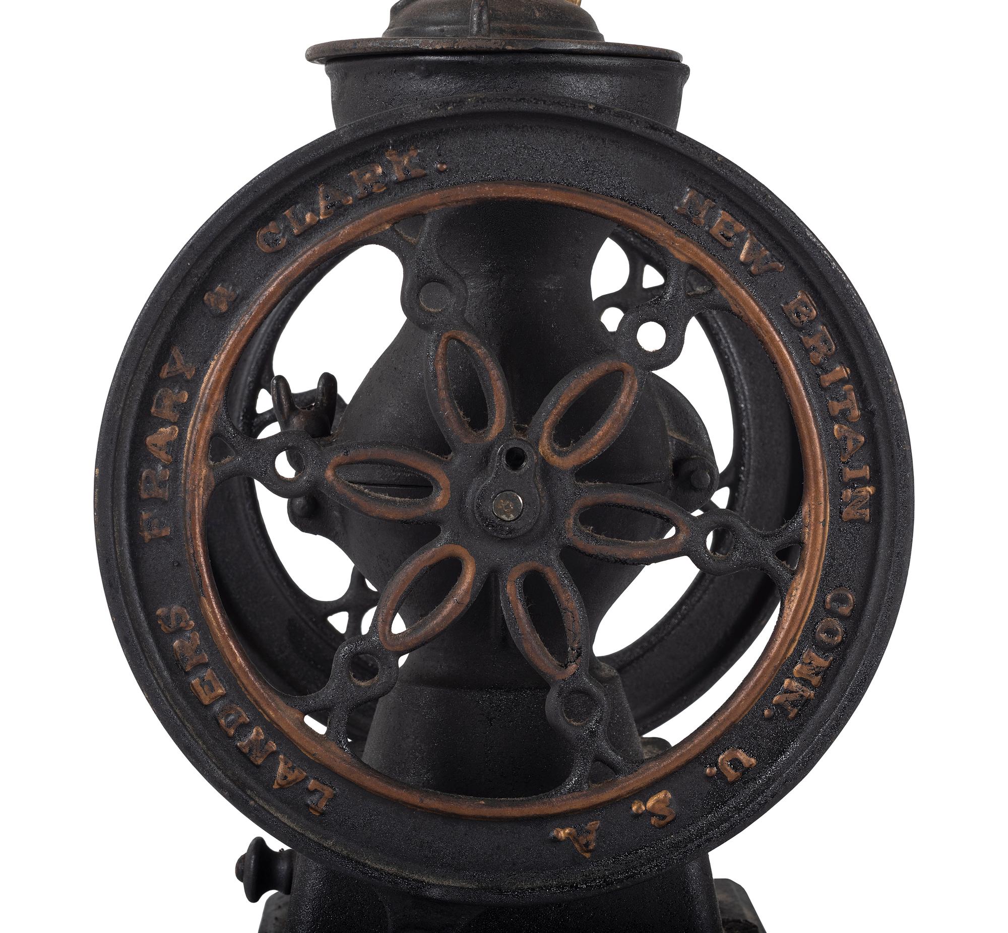 A Landers, Frary & Clark Cast Iron Coffee Mill with an Eagle Finial