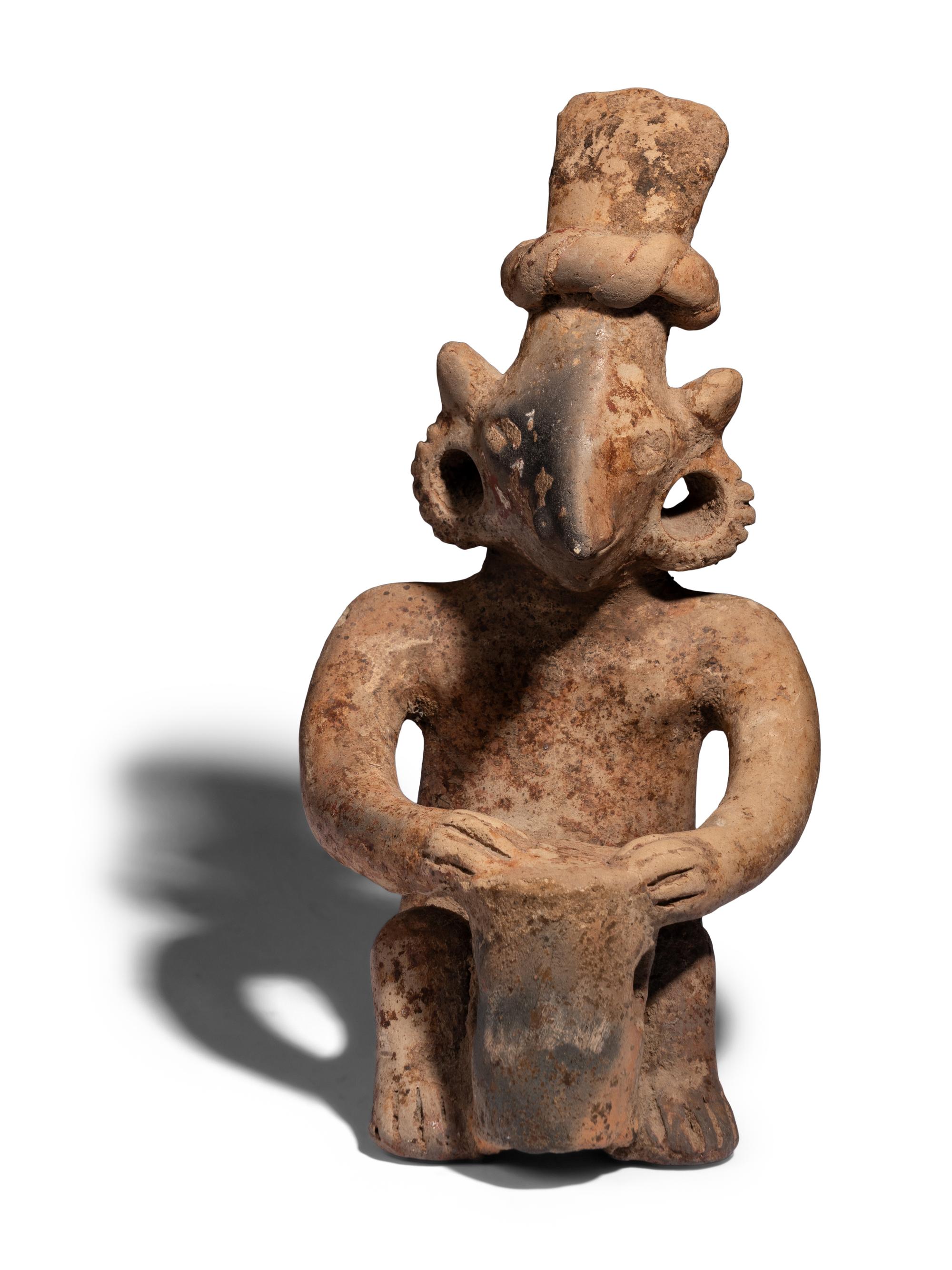 A Jalisco Terracotta Seated Drummer