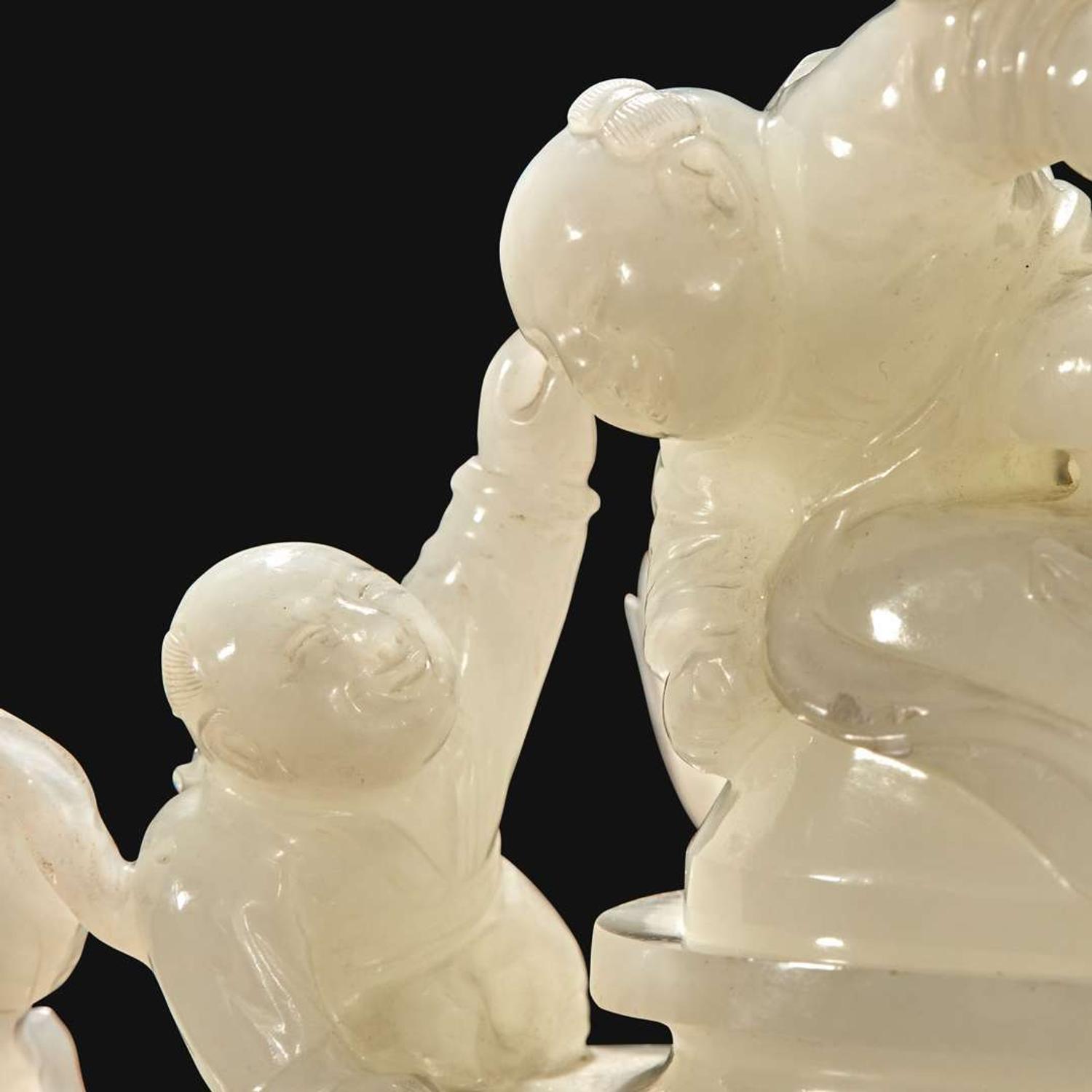 A Chinese carved white jade "Boys" vase and cover Qing Dynasty, 18th/early 19th Century