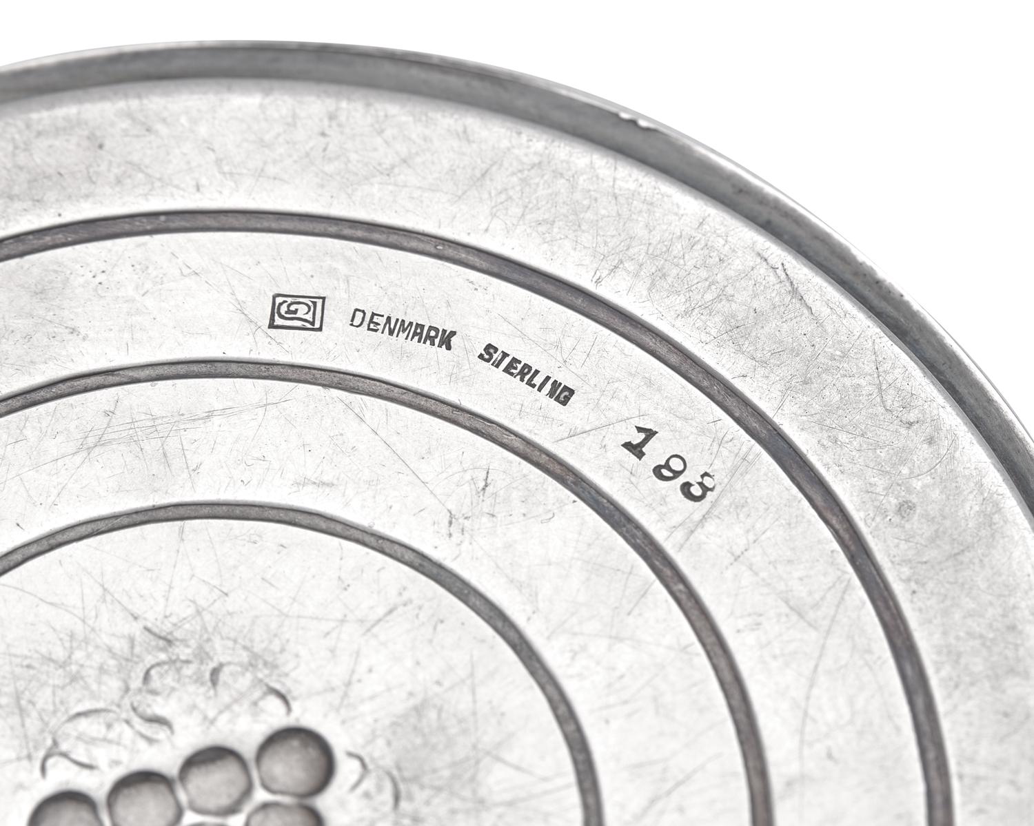 A Set of Twelve Georg Jensen Silver Coasters