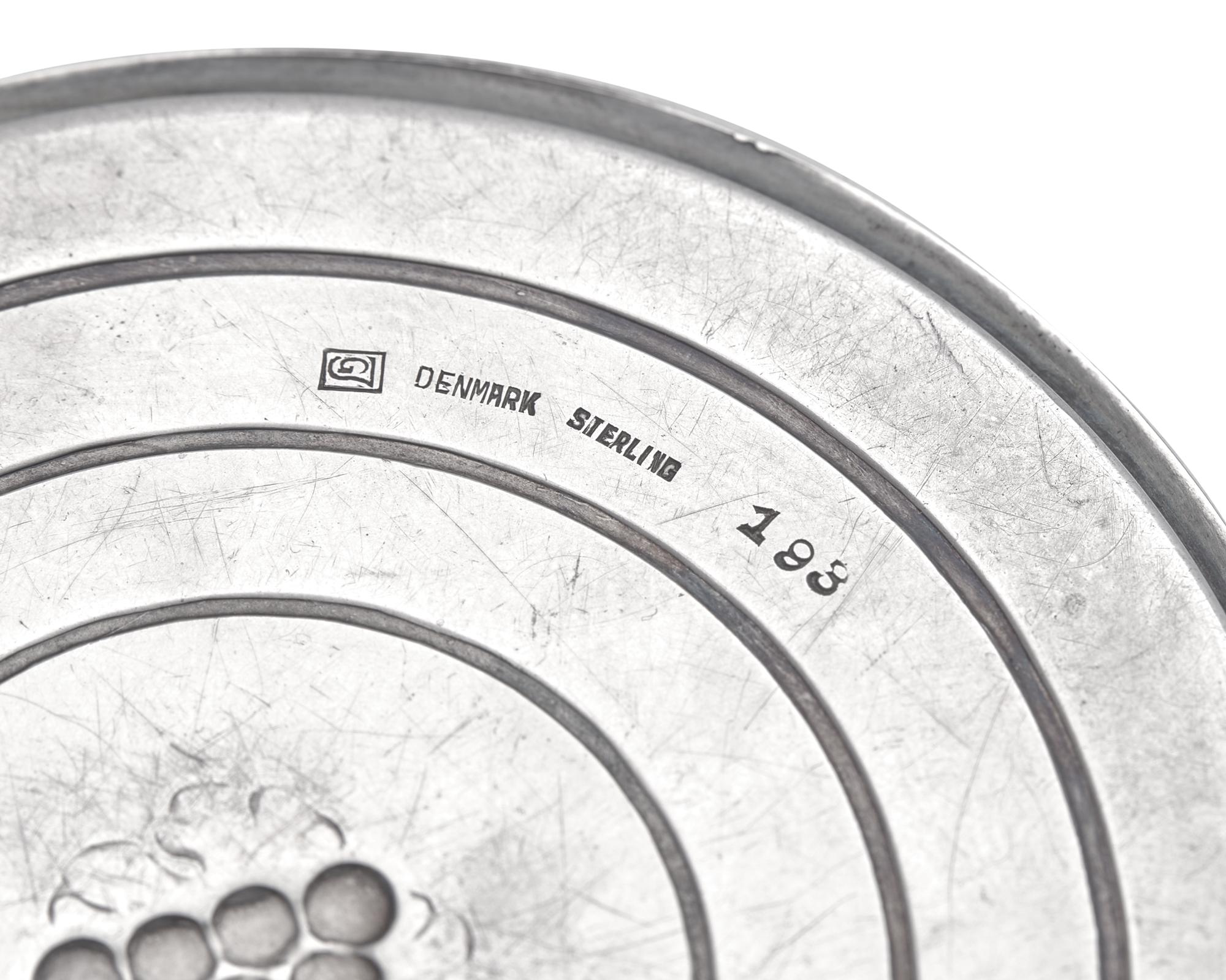 A Set of Twelve Georg Jensen Silver Coasters