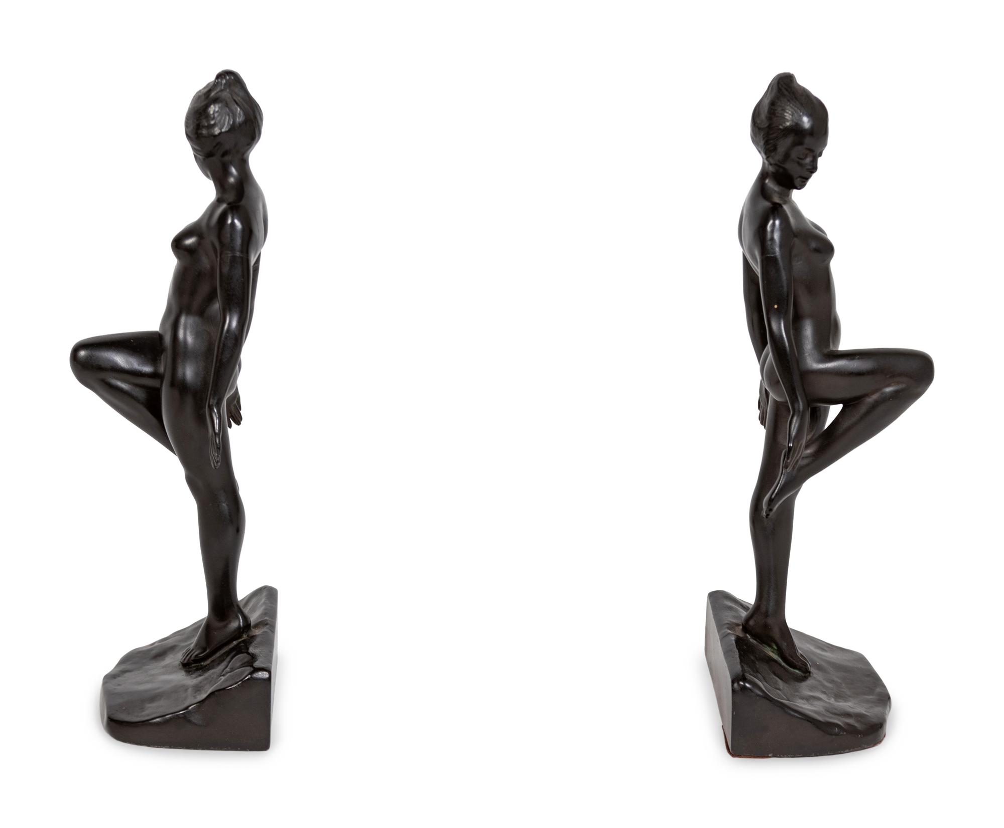 A Pair of Cast Metal Figural Bookends