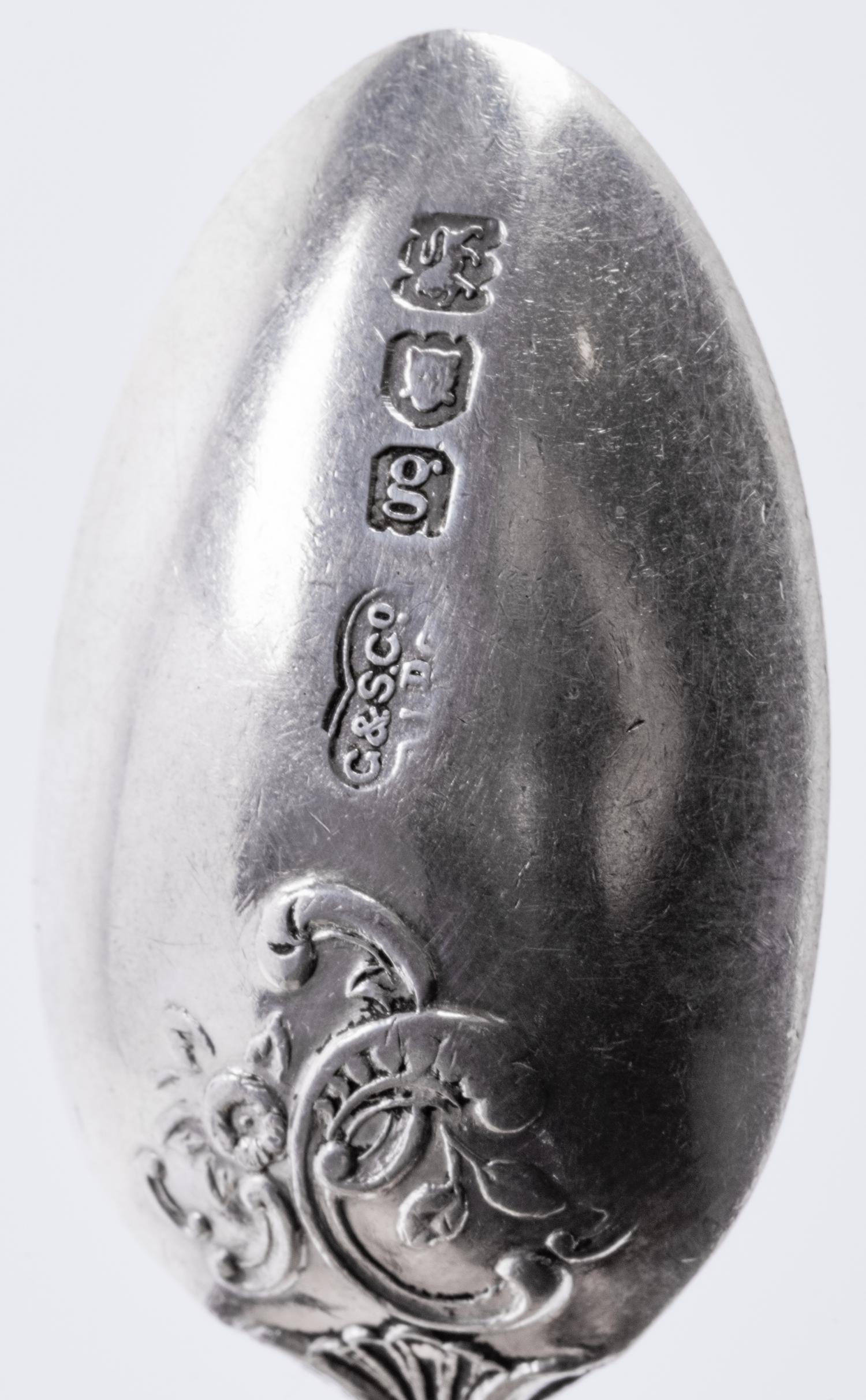 A Group of Thirty-Two English Silver Teaspoons