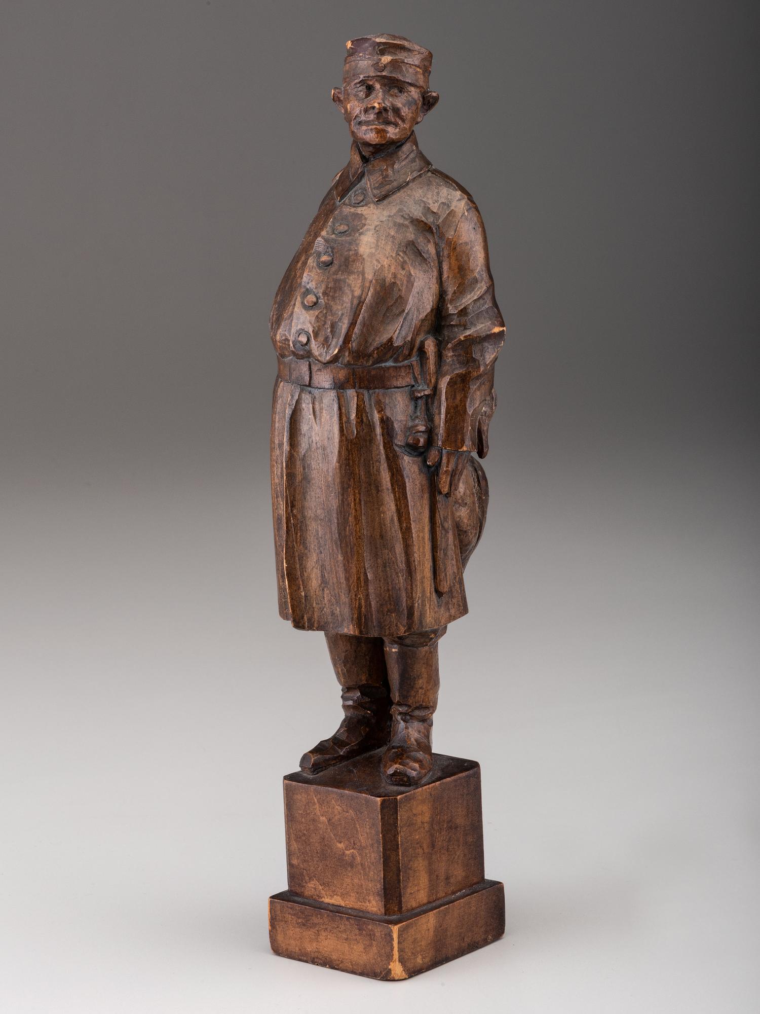 A German Carved Wood Figure of a Duck Hunter