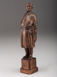 A German Carved Wood Figure of a Duck Hunter