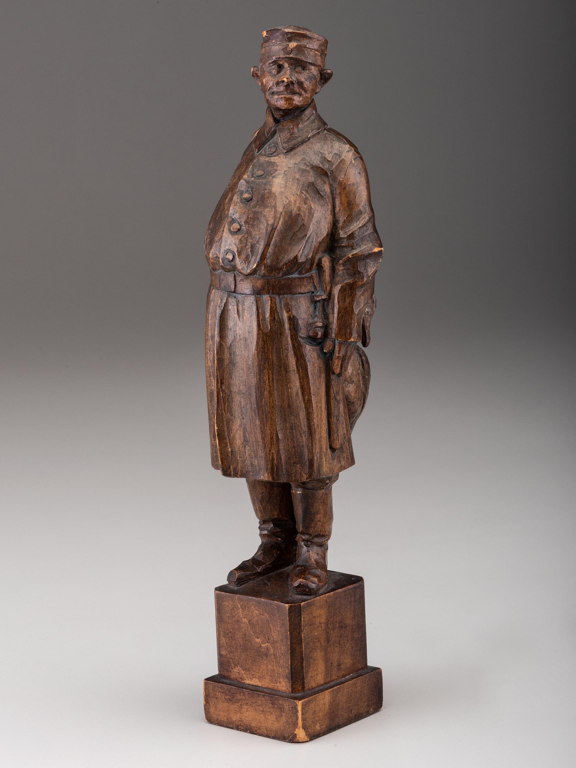 A German Carved Wood Figure of a Duck Hunter