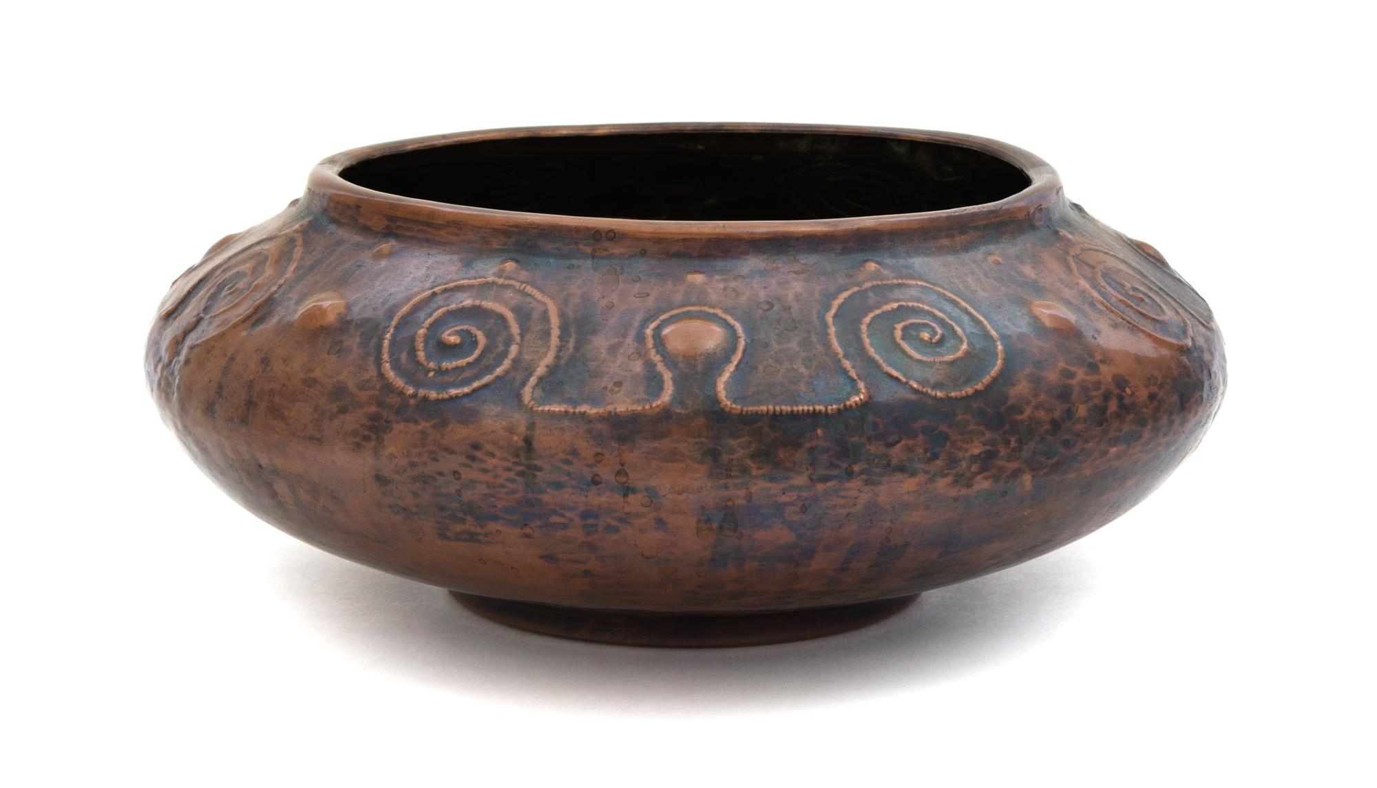 An Arts and Crafts Copper Bowl Height 5 x diameter 12 inches.