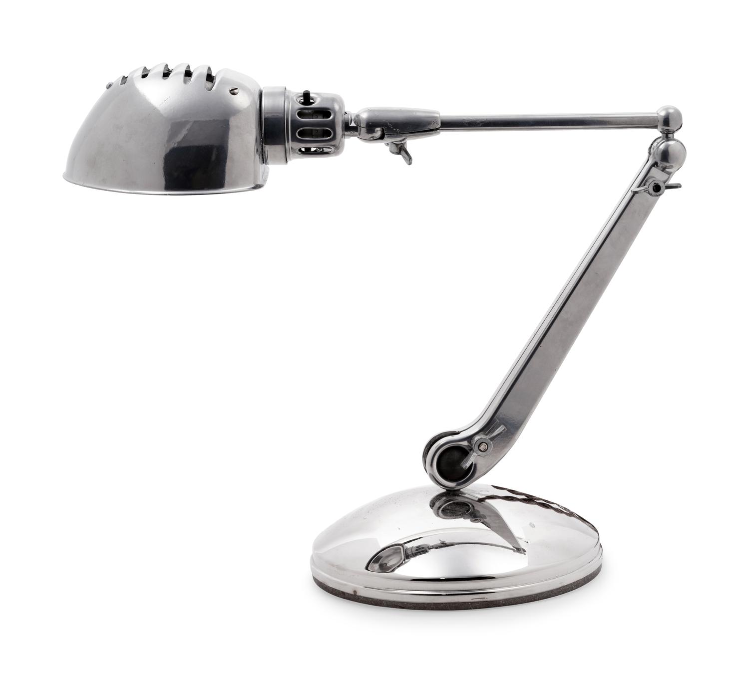 A Chromed Metal Articulated Desk Lamp