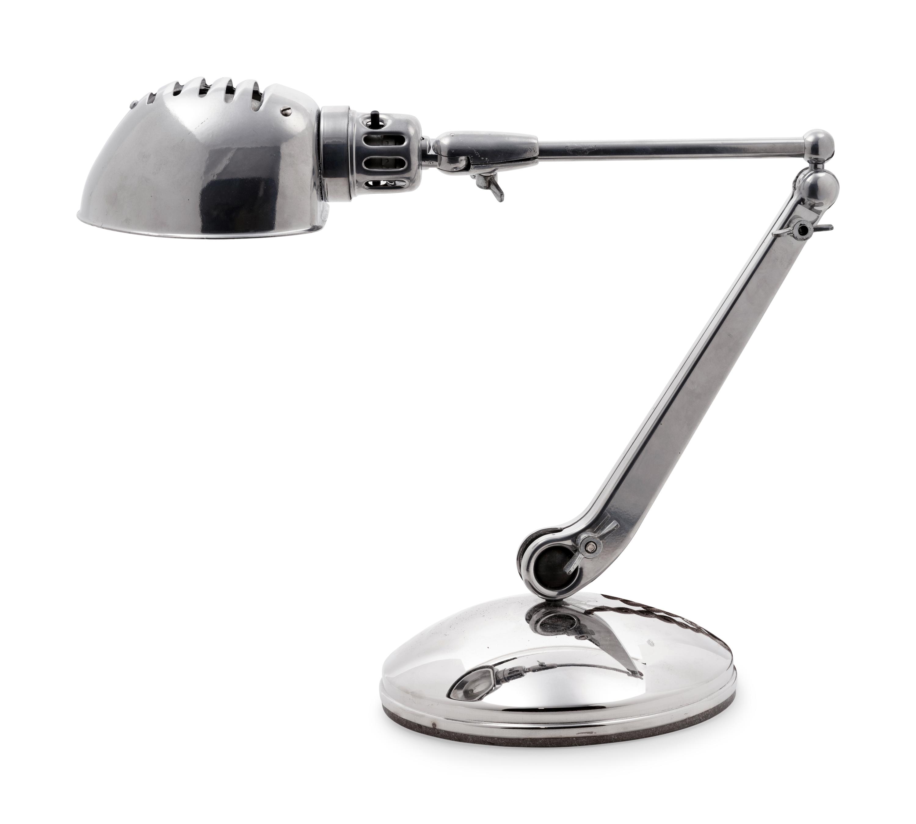 A Chromed Metal Articulated Desk Lamp