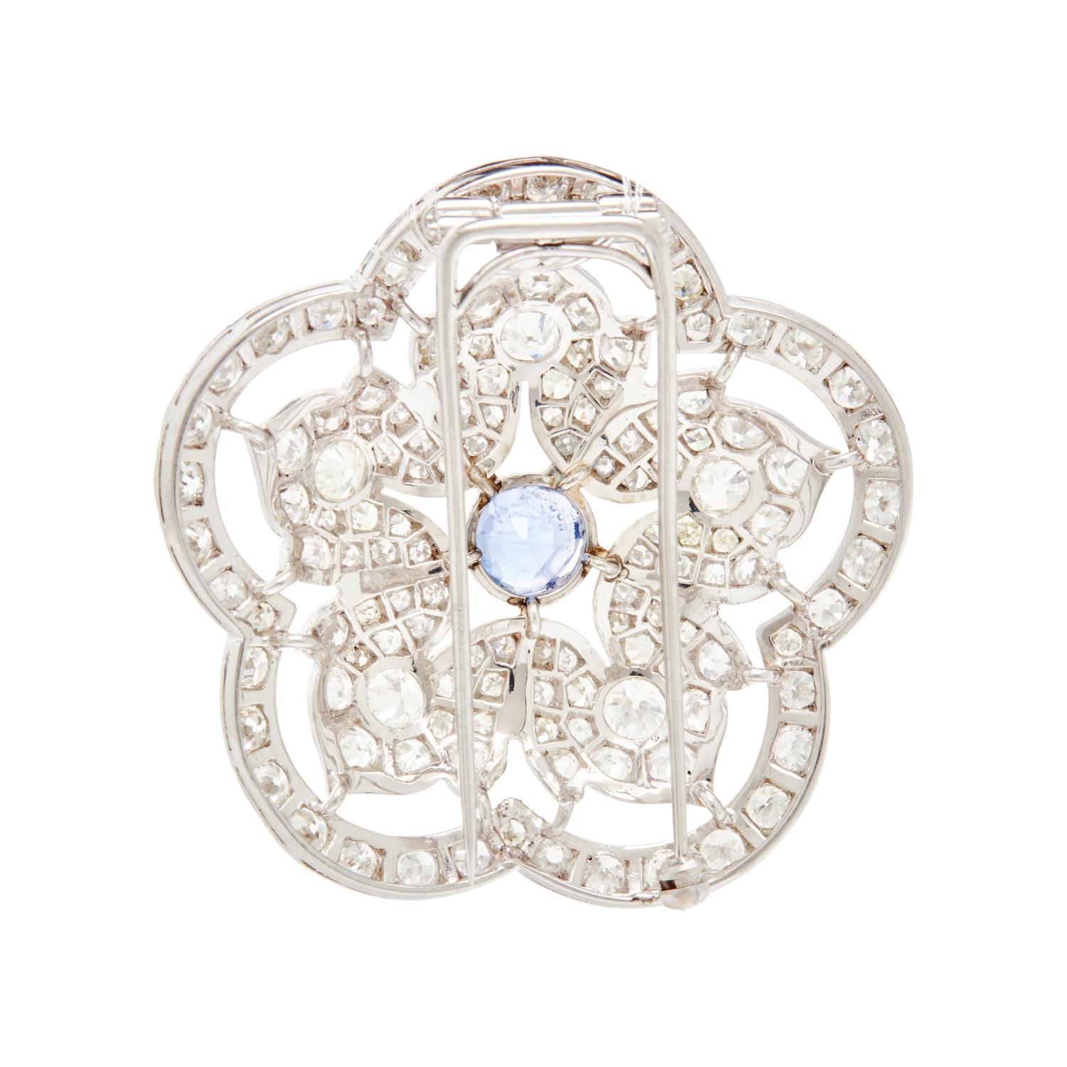 PLATINUM, DIAMOND, AND SAPPHIRE BROOCH