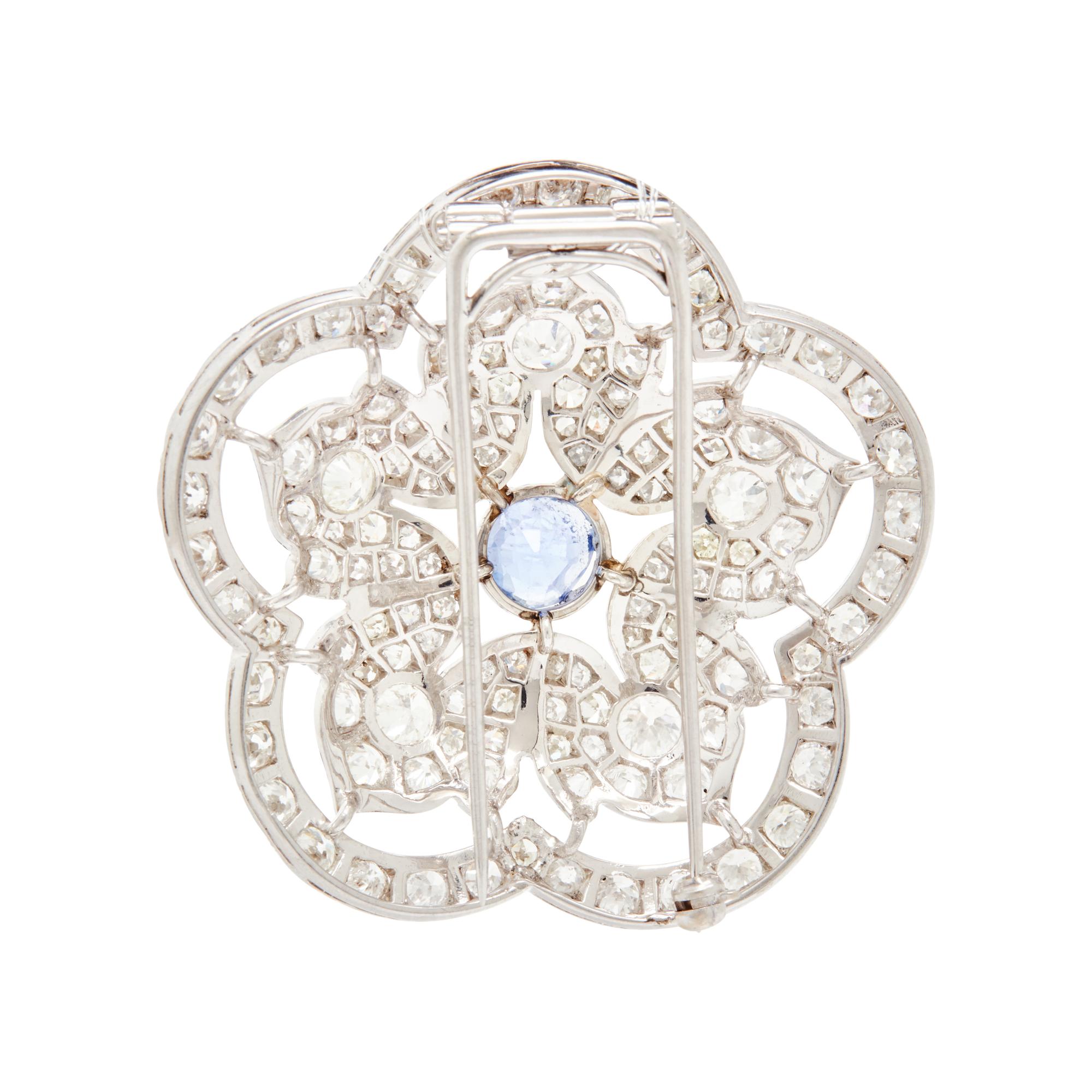 PLATINUM, DIAMOND, AND SAPPHIRE BROOCH