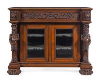 An R.J. Horner Carved Oak Man of the Mountain Serving Cabinet
