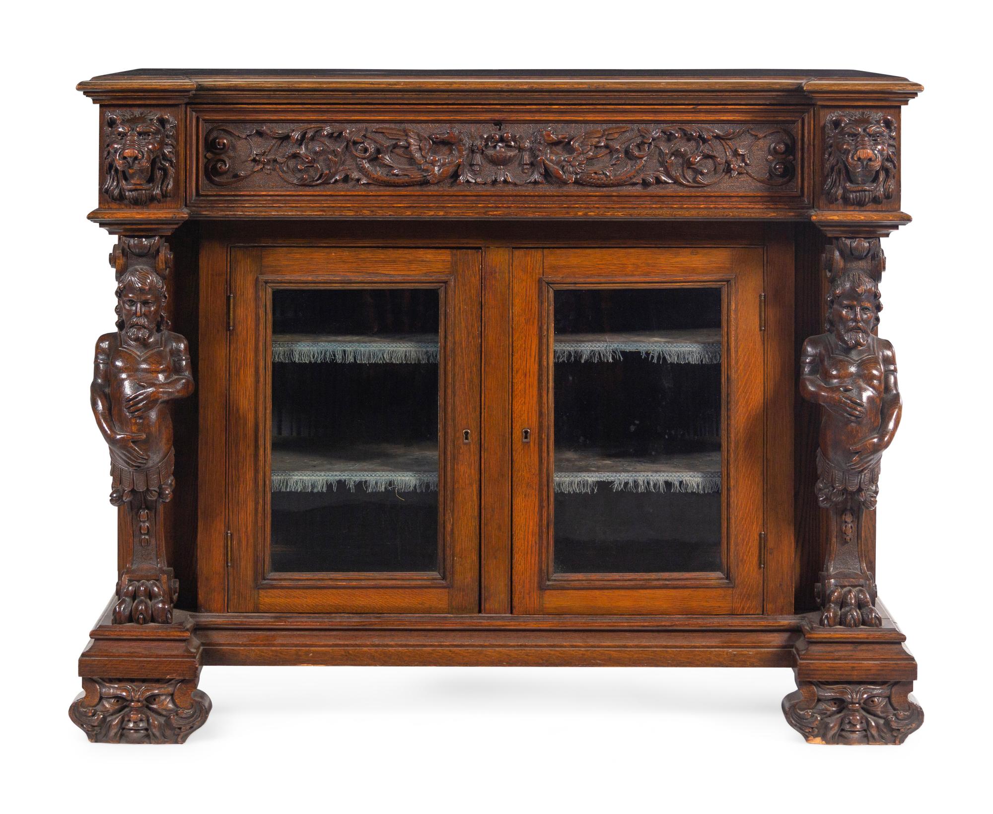 An R.J. Horner Carved Oak Man of the Mountain Serving Cabinet
