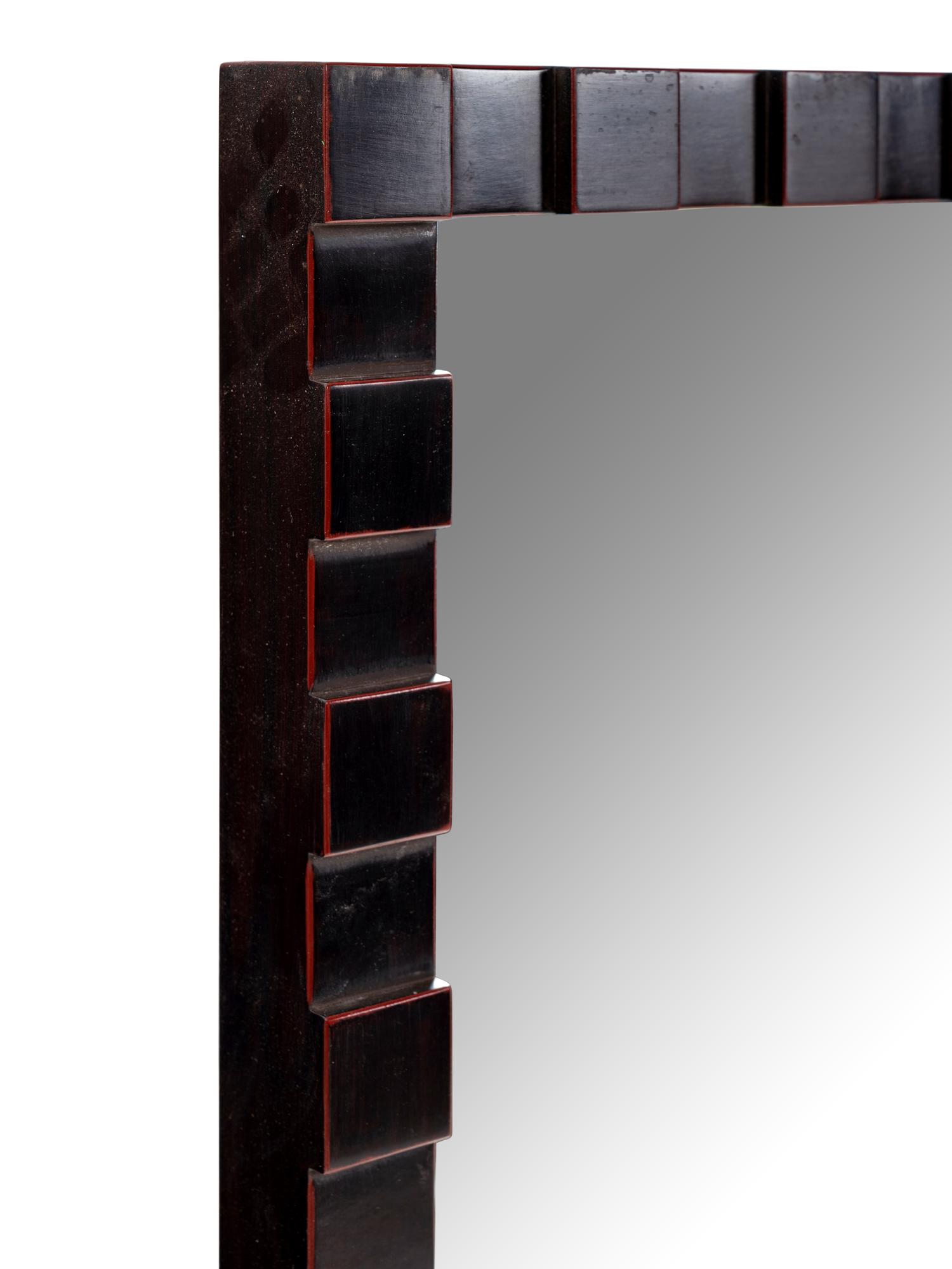 A Contemporary Carved Mahogany Mirror