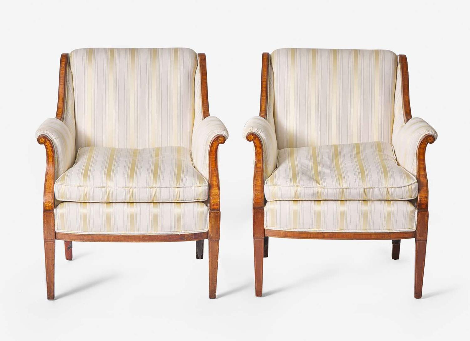 A pair of George III style inlaid mahogany and satinwood armchairs, likely late 19th century
