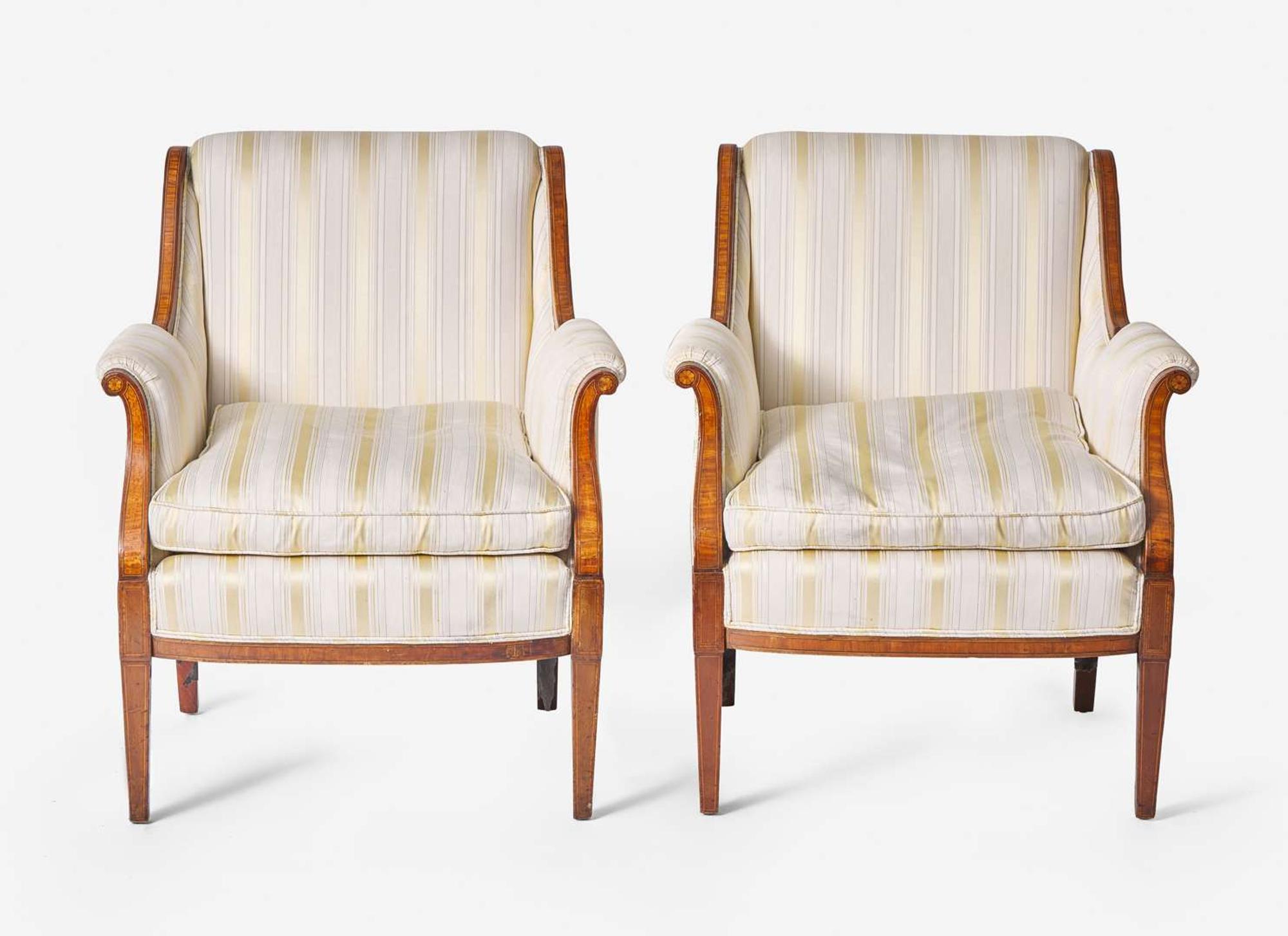 A pair of George III style inlaid mahogany and satinwood armchairs, likely late 19th century