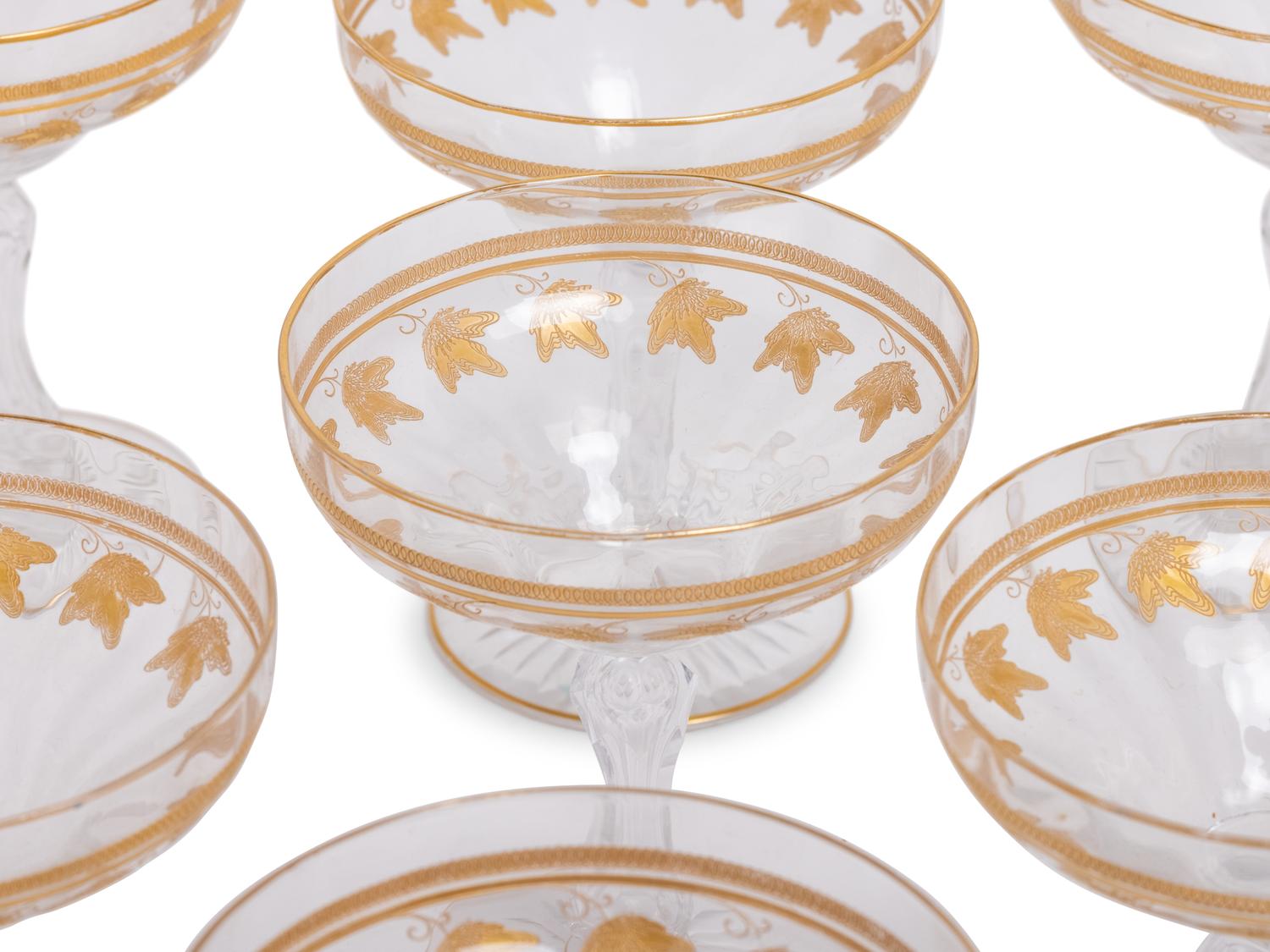 A Set of Eleven Parcel Gilt Champagne Coupes