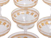 A Set of Eleven Parcel Gilt Champagne Coupes
