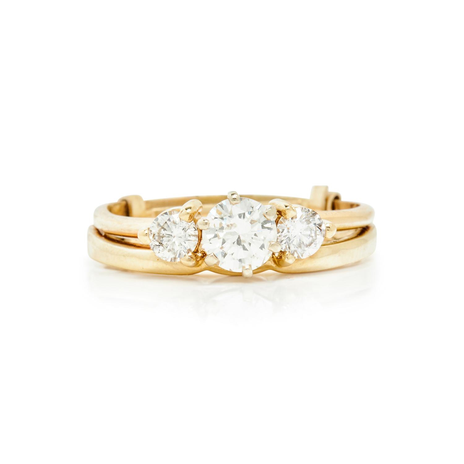 YELLOW GOLD AND DIAMOND THREE STONE RING