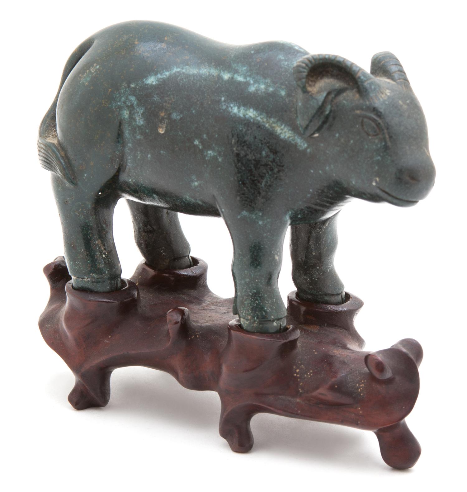 A Chinese Carved Stone Figure of a Bull Height 3 inches. — 19TH CENTURY