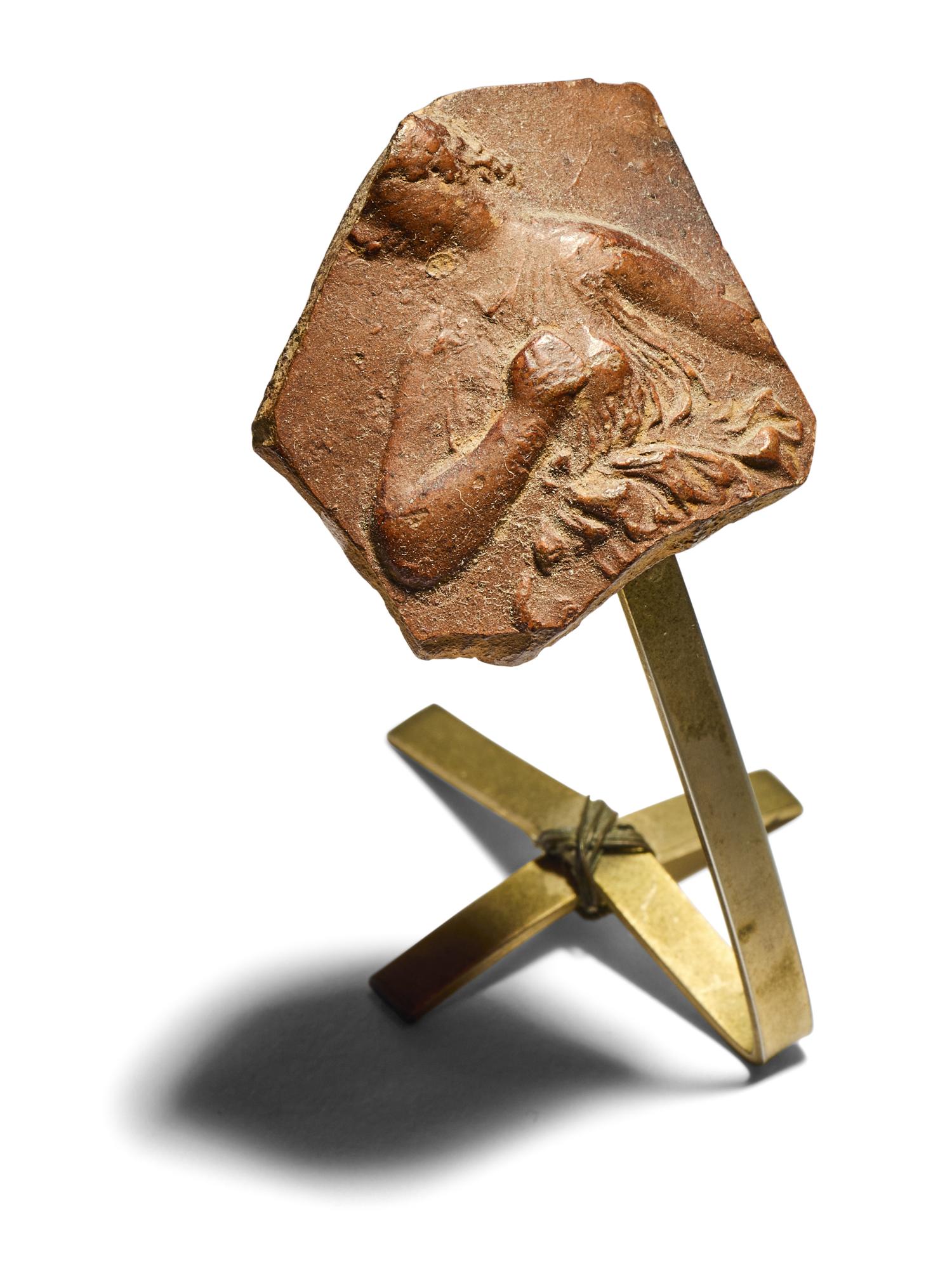 A Hellenistic Red-Ware Fragment with a Robed Woman