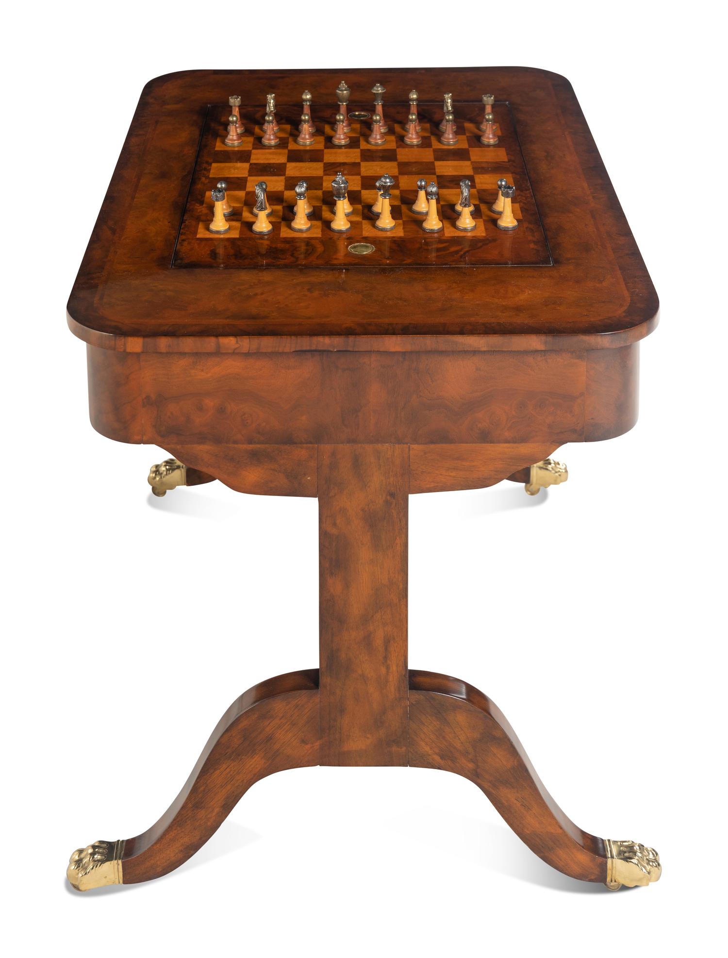 A Regency Style Walnut Game Table