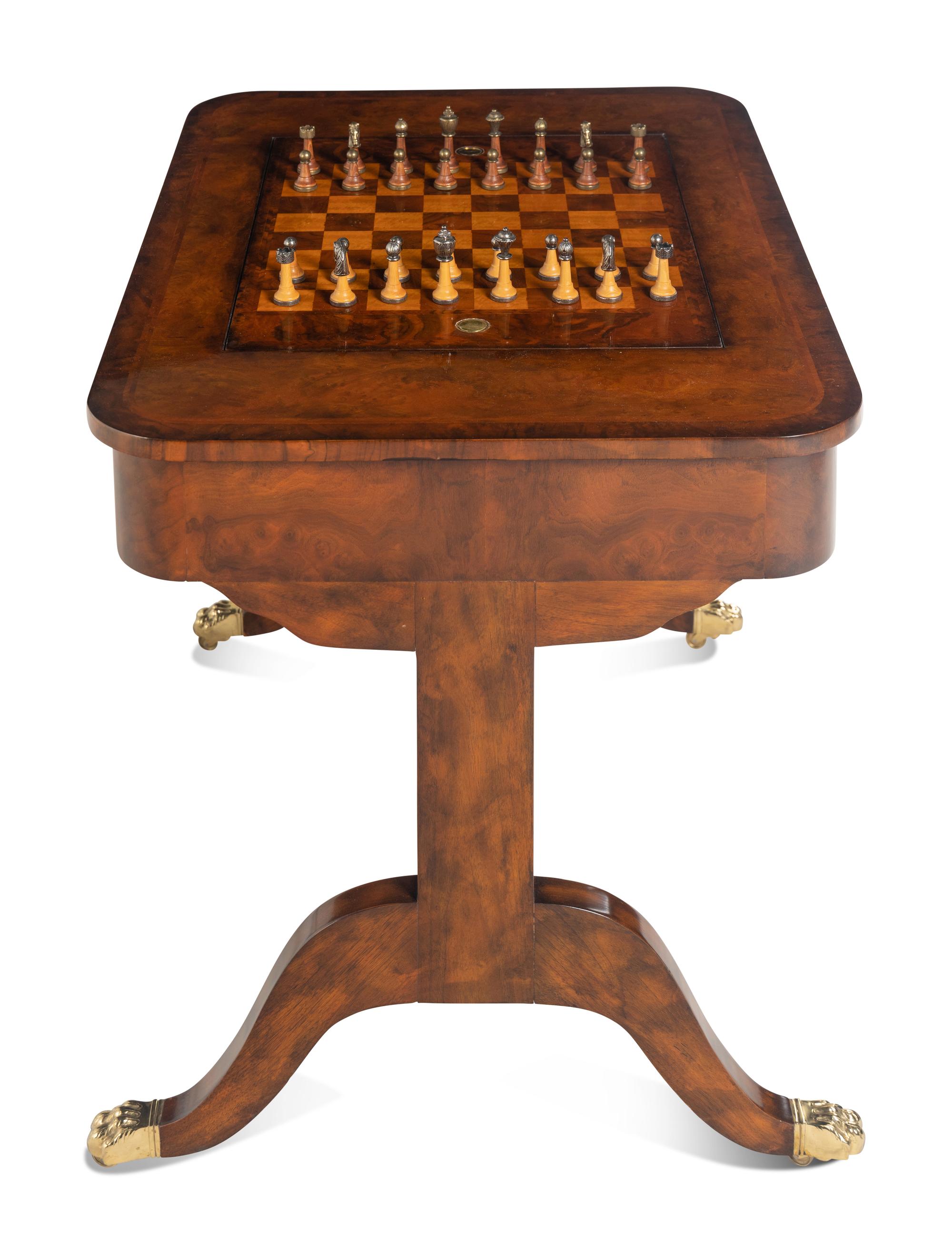 A Regency Style Walnut Game Table