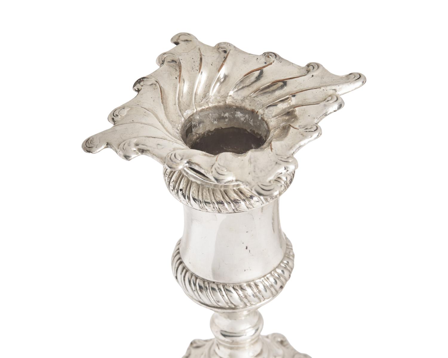 A Set of Four George III Weighted Sheffield Plate Candlesticks