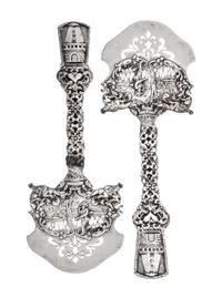 A Pair of American Silver Asparagus Servers, Marshall Field & Co., Chicago, IL, the openwork blade decorated with a hunter and dog in a