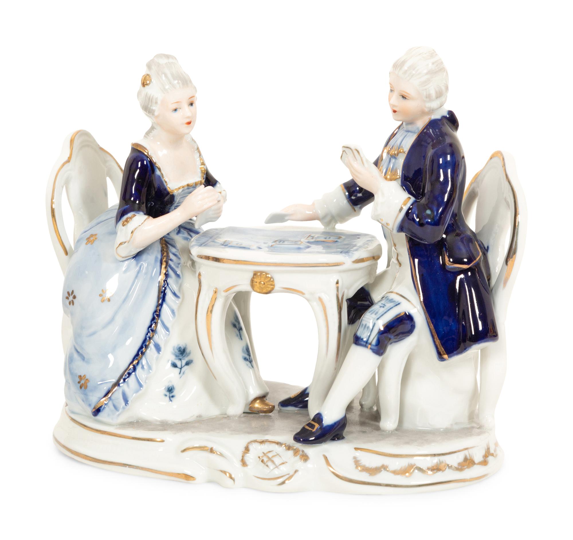 A Meissen Porcelain Sedan Chair and Two Figural Groups