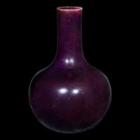 A Chinese aubergine-glazed porcelain bottle vase, Tianqiuping 茄皮紫天球瓶一只