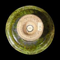 A Chinese Green Glazed Marbled Stem Dish, Possibly Tang Dynasty 或爲唐 綠釉絞胎高足盤