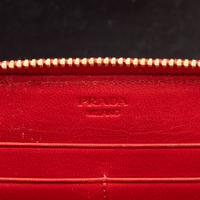 PRADA, SMOKING LIPS LEATHER CLUTCH & WALLET