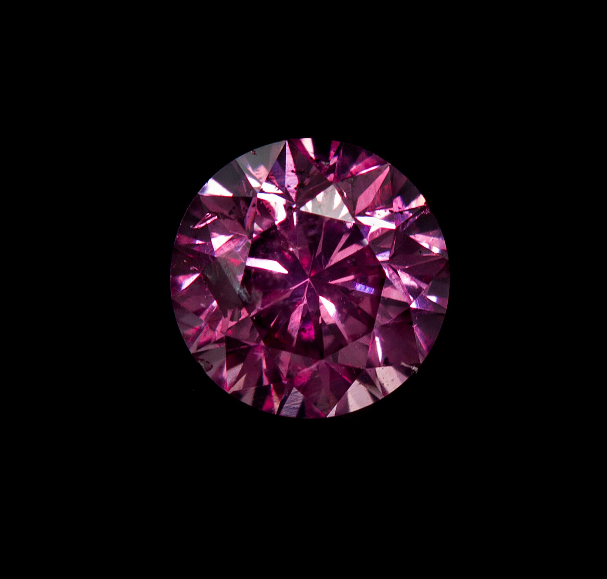 A 0.27 Carat Round Brilliant Cut Fancy Intense Purplish Pink Diamond,