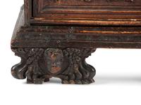 A Baroque Highly Carved Walnut Commode
