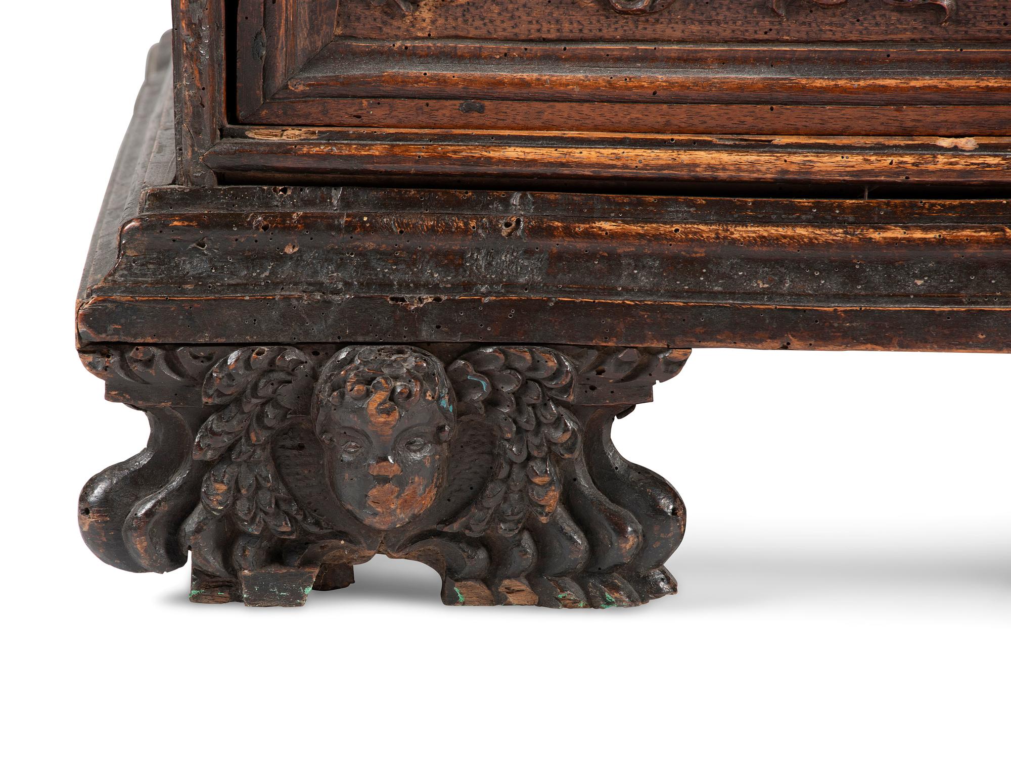 A Baroque Highly Carved Walnut Commode